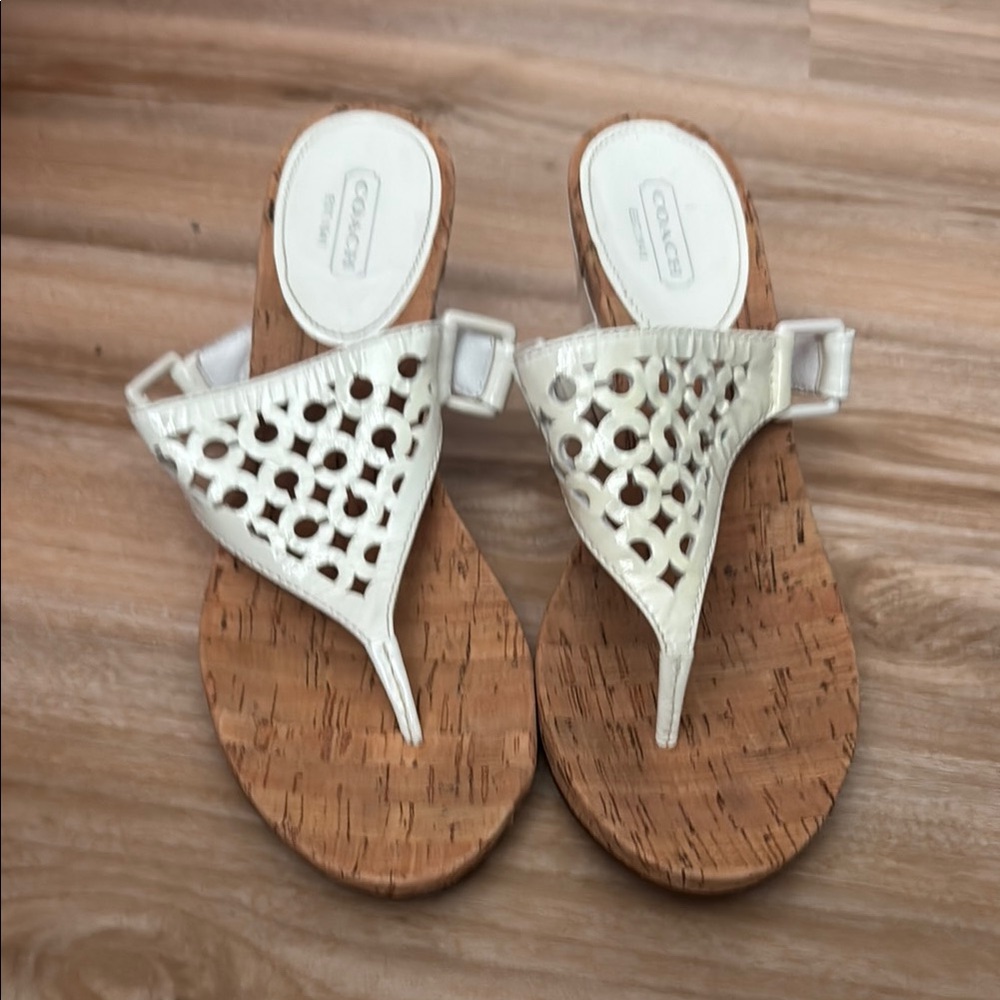 Coach White Sandals with Intricate Cutout Design